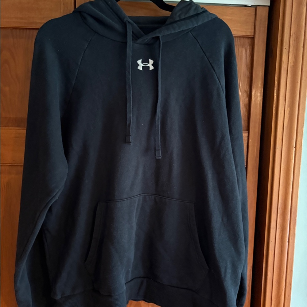 Under Armour Men's black Hoodie. Slightly faded but still has a lot of life.